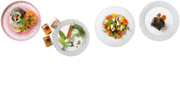 4品の料理とギターが写っている様子